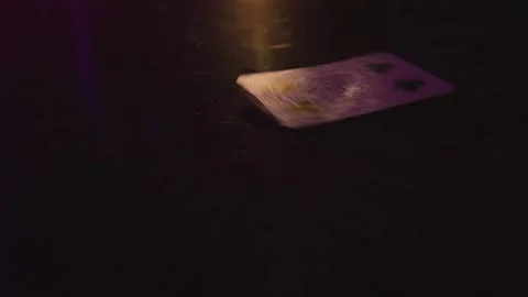 The card spins on the table Stock Footage 141977900