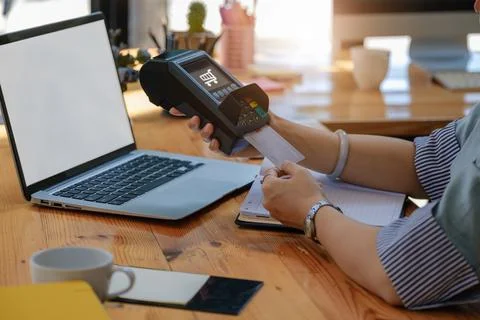 Card swipe machine, cyber security, convenience of payment, staff use EDC card Stock Photos
