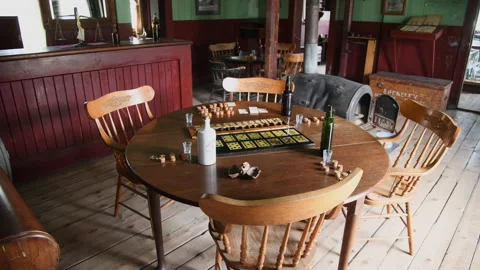 Card table in bar room of historic hotel, roadhouse, 4k Stock Footage 164343322