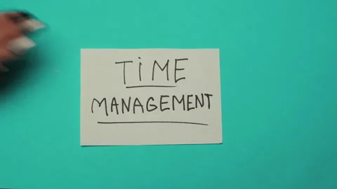 A card with the text Time Management Stock Footage 238015807
