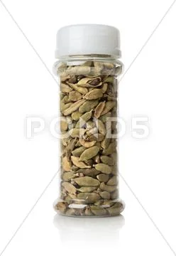 Cardamom in a glass jar Stock Photos