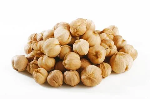 Cardamon seeds on white background Stock Photos