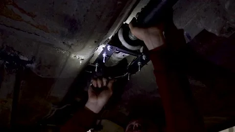 Cardan shaft a mechanic disassembles an old Video stock 221433555