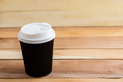 Cardboard biodegradable eco-friendly cups on a wooden background Stock Photos
