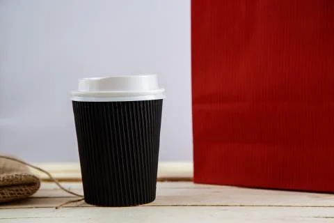 Cardboard biodegradable eco-friendly cups on a wooden background Stock Photos