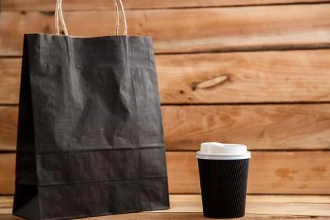 Cardboard biodegradable eco-friendly cups on a wooden background Stock Photos