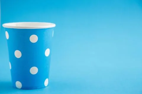 Cardboard biodegradable eco-friendly cups on a blue isolated background Stock Photos