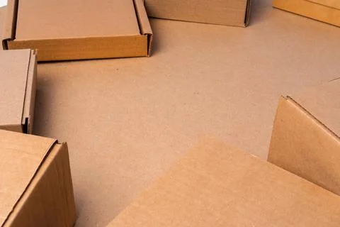 Cardboard box on beige background in studio Foto stock