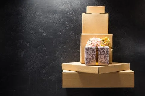 Cardboard box on black background Stock Photos