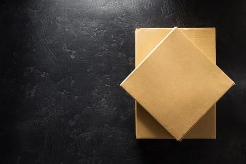 Cardboard box on black background 스톡 사진