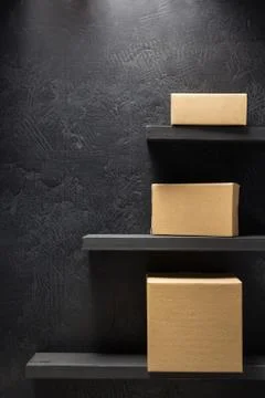 Cardboard box on black background Stock Photos