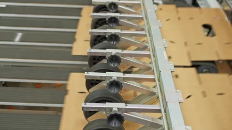 Cardboard Box Blanks Moving Through Automated Packaging Machine Rollers Stock Footage 337438244