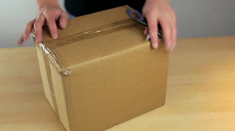 Cardboard box opened Vídeos de archivo 34528644