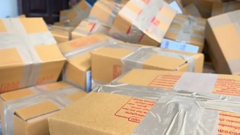 Cardboard box package sender and postcode Thai word screen on parcel Stock Footage 225124926