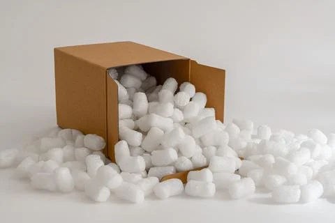 Cardboard box with packing peanuts Stock Photos