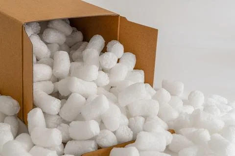 Cardboard box with packing peanuts Stock Photos