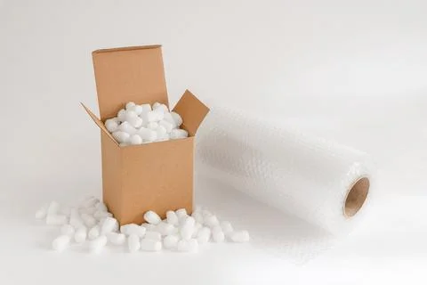 Cardboard box with packing peanuts Stock Photos