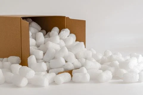 Cardboard box with packing peanuts Stock Photos