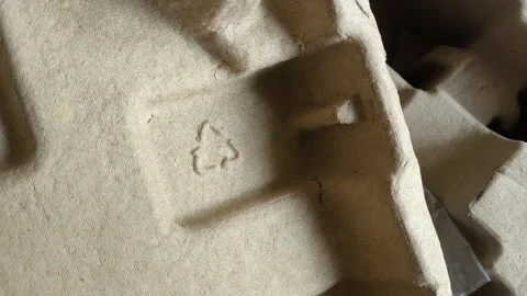 Cardboard box with recycling mark. The concept of cardboard and paper waste Stock Footage 318875003