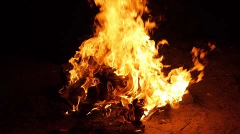 Cardboard box remains burning in fire Stock Footage 68655596