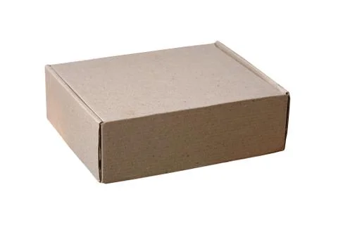 Cardboard box on a white background isolate. Closed brown box home delivery. Stock Photos