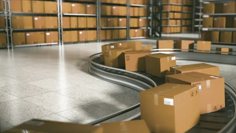 Cardboard boxes with a 4K loop on a conveyor belt, isolated against the backgrou Stock Footage 221615091