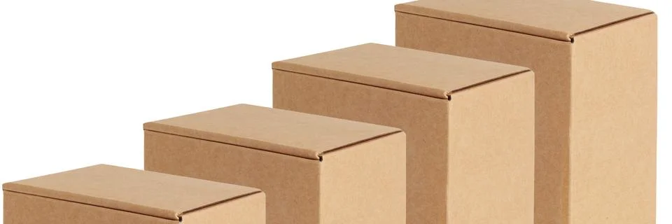Cardboard boxes are the same located in a row diagonally. Isolated on a white 写真素材