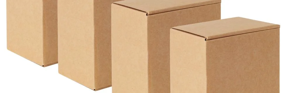 Cardboard boxes are the same located in a row diagonally. Isolated on a white 写真素材