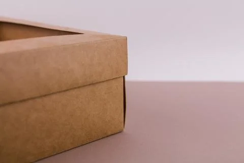 Cardboard boxes in the background for moving or for packaging Stock Photos