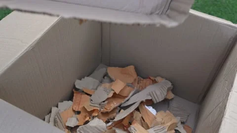 Cardboard boxes with crumpled paper inside for packaging goods. Stock Footage 230222625