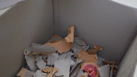 Cardboard boxes with crumpled paper inside for packaging goods. Stock Footage 230222664