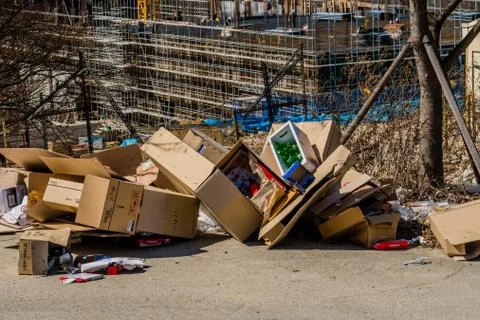 Cardboard boxes filled with trash Stock Photos