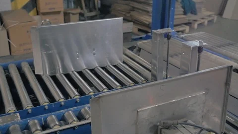 Cardboard boxes fixed on production line at modern palnt Stock Footage 113398405