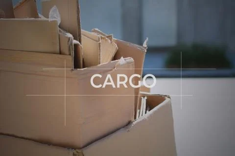 Cardboard boxes with focus on "cargo" text Foto stock