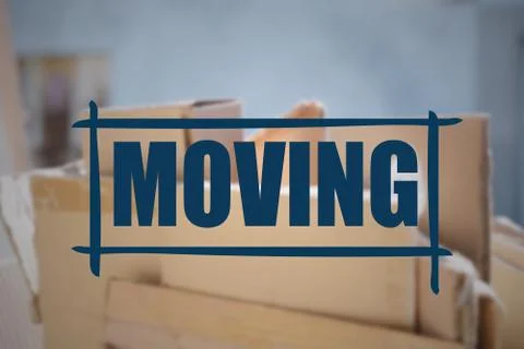 Cardboard boxes with focus on "moving" text Foto stock
