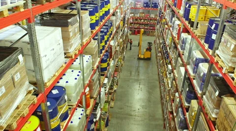 Cardboard boxes inside a storage warehouse Stock-Footage 54971941