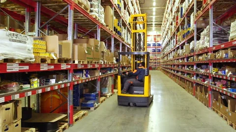 Cardboard boxes inside a storage warehouse Stock Footage 54971944