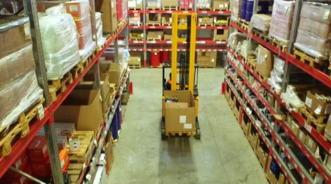 Cardboard boxes inside a storage warehouse. Stock Footage 54972373