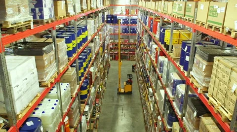 Cardboard boxes inside a storage warehouse Stock Footage 54972470