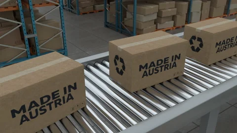Cardboard boxes with Made in Austria on conveyor belt line isolated on warehouse Stock Footage 231440449