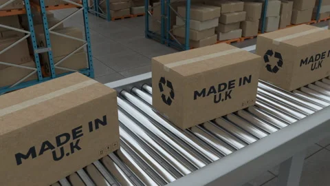 Cardboard boxes with Made in UK on conveyor belt line isolated on warehouse Stock Footage 231439737