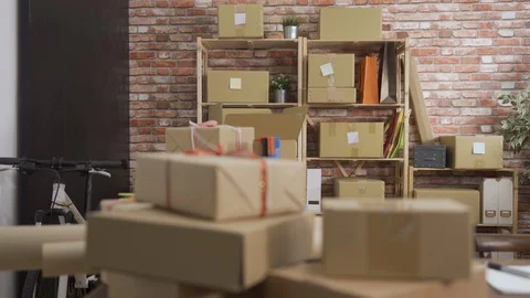 Cardboard boxes in modern interior small business Video stock 109488239