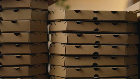 Cardboard boxes for pizza, stack of pile of boxes for cooked pizza. Takeaway Stock Footage 248725134
