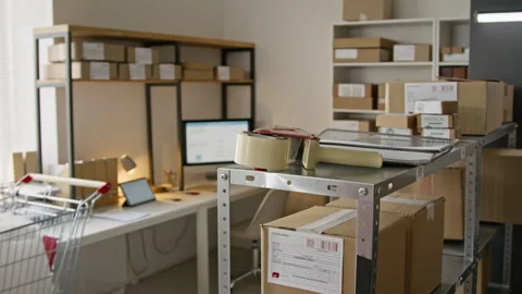 Cardboard Boxes Ready for Shipping in Ecommerce Packaging Room Stock Footage 346048946
