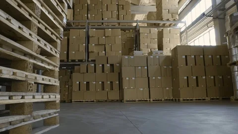 Cardboard Boxes on shelves Inside Storage. Warehouse complex. Logistics Terminal Stock Footage