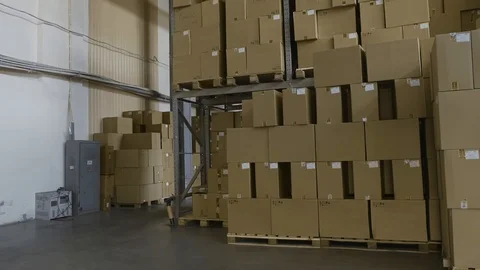 Cardboard Boxes on shelves Inside Storage. Warehouse complex. Logistics Terminal Stock Footage 98544752