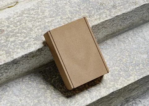 Cardboard boxes on the stairs with texture use for mockup Ilustração Stock