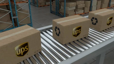 Cardboard boxes with Ups Logo on conveyor belt line Stock Footage 230085544