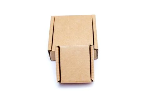 Cardboard boxes of various sizes isolated on white background. Stock Photos