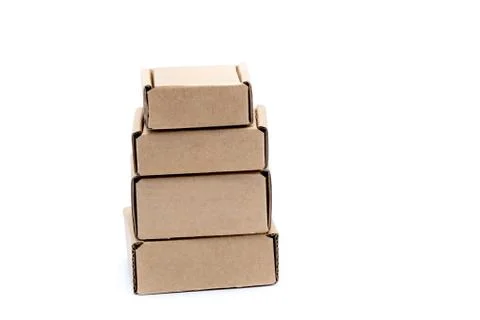 Cardboard boxes of various sizes isolated on white background. Stock Photos